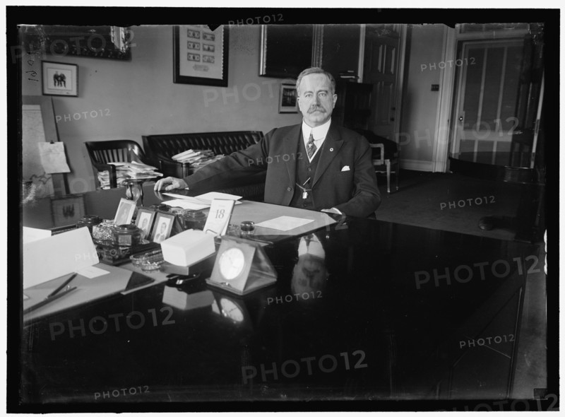 John Skelton Williams at desk, between 1913 and 1918. Creator: Harris & Ewing.