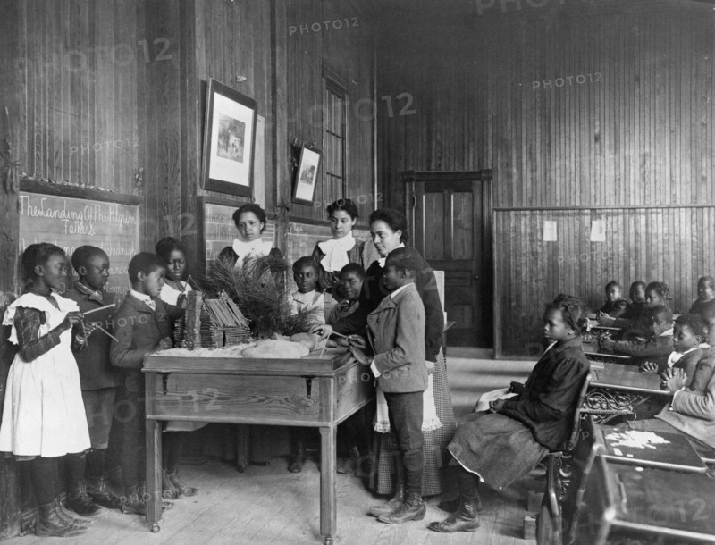 Thanksgiving Day lesson at Whittier, 1899 or 1900. Creator: Frances Benjamin Johnston.
