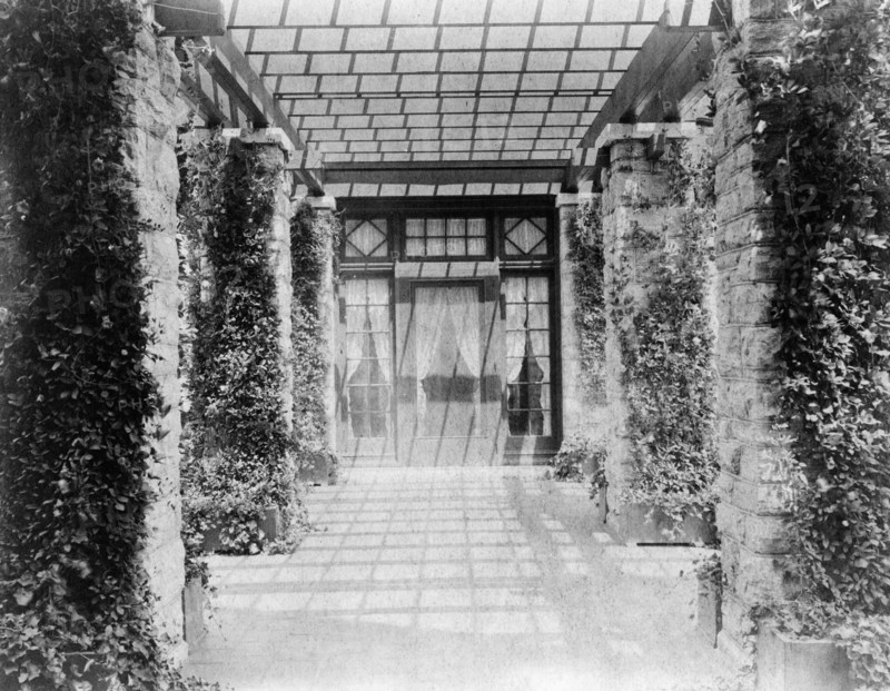 View of pergola, toward door, to home of Edmund Cogswell Converse, Greenwich, Connecticut, 1908. Creator: Frances Benjamin Johnston.