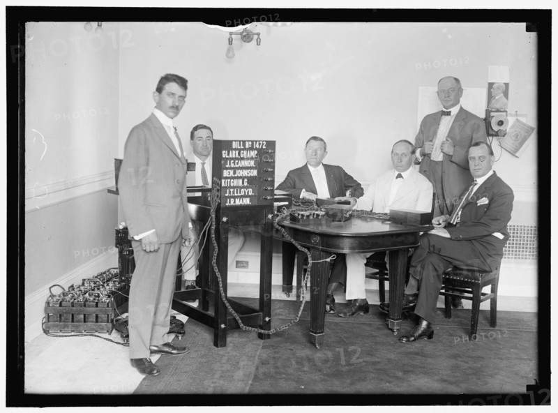 Bobroff voting machine being considered for use in house, between 1910 and 1917. Creator: Harris & Ewing.