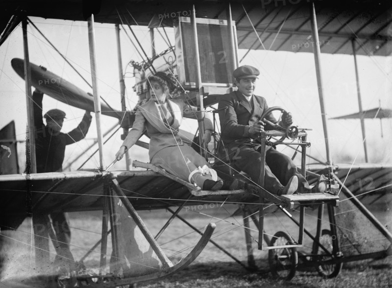Senorita Lenore Riviero [sic] with Anthony Jannus; In Rex Smith Aeroplane, 1912. Creator: Harris & Ewing.
