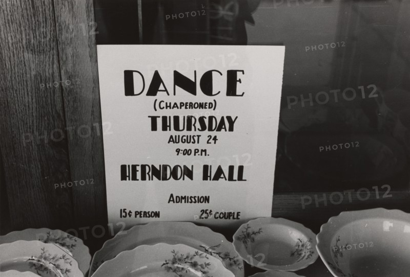 Poster in drugstore window, Syracuse, Kansas,  1939-08.