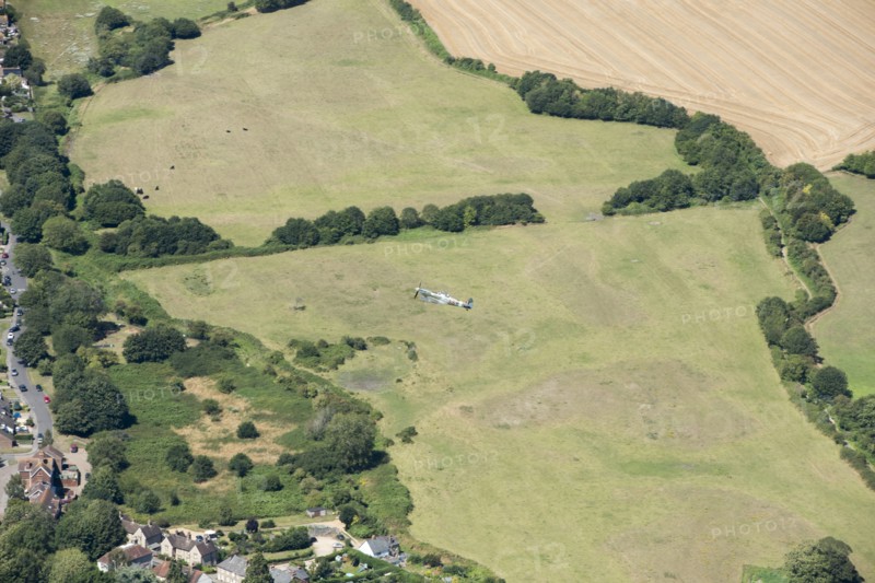 A two seat Spitfire in flight near Goodwood Aerodrome, West Sussex, 2020.