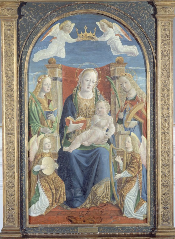 Virgin and Child, with Saint Dorothea, Saint Catherine and two angel musicians, c.1500.