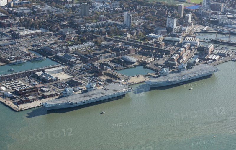 The Royal Navy's two largest aircraft carriers in dock, Portsmouth, Hampshire, 2020. Creator: Damian Grady.