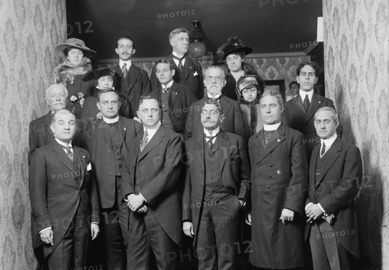 Unidentified Group On Entrance Stairway of John Barrett's Residence; 12 Men, 3 Women, Child, 1915.  Creator: Harris & Ewing.
