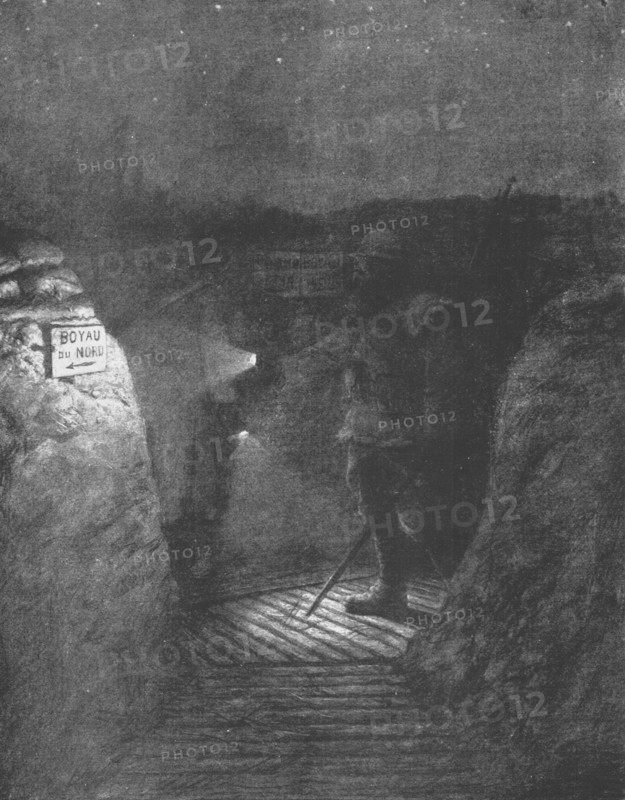 ''Une tournee d'inspectionnocturne dans les boyaux, a la lueur discrete des lampes de poche.', 1916. Creator: Unknown.