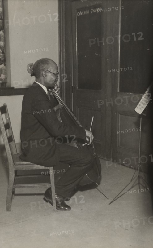 A cello student of the Adult Education Classes under the Federal Music Project at Carlton YMCA, 1936.
