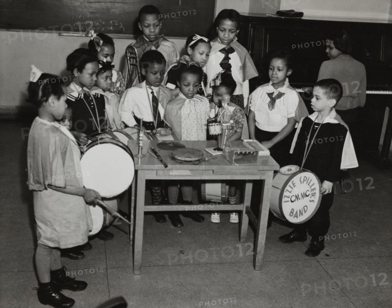 Drum students around a table, 1938.