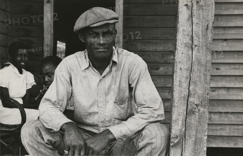 Sharecropper on Sunday, Little Rock, Ark, October 1935.