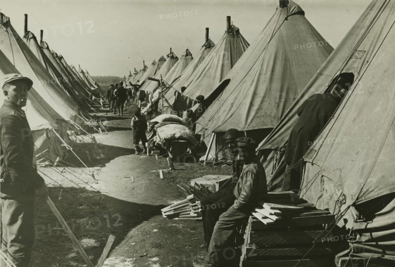 African Americans at Forrest City flood refugee camp, Arkansas, 1930s.  Creators: Farm Security Administration, Edwin Locke.