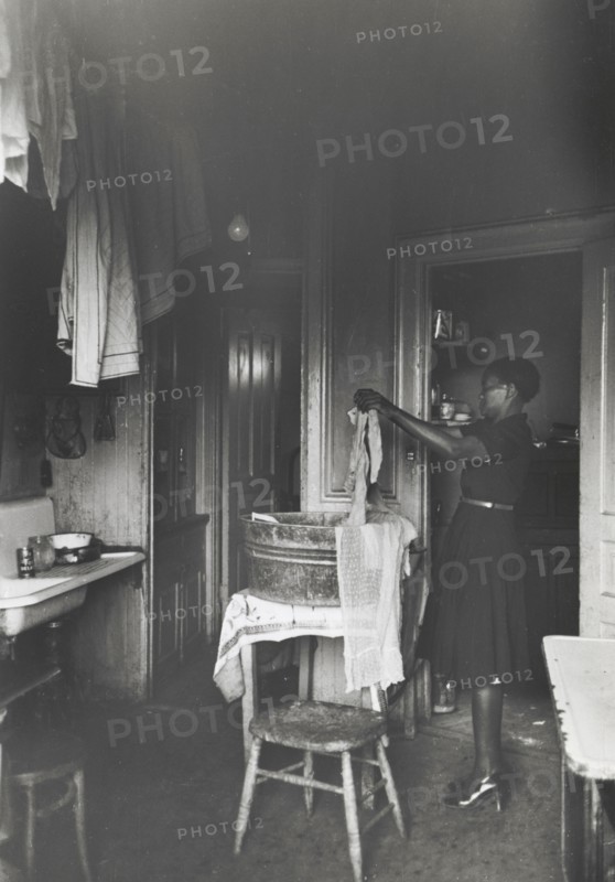 Kitchen of apartment occupied by Negroes, South Side of Chicago, Illinois, April 1941.
