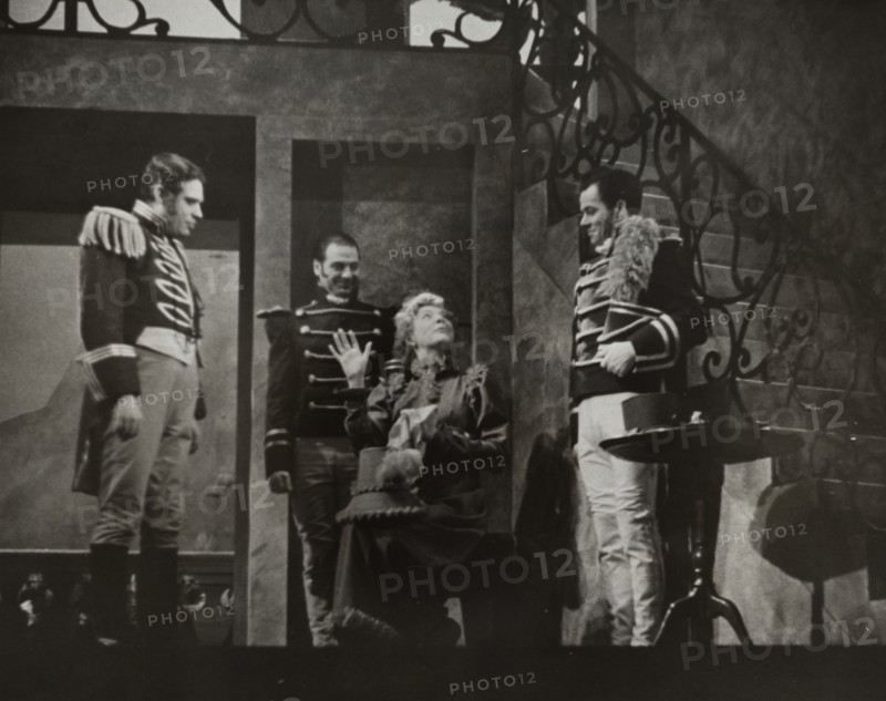 Woman talking to three men, 1938.
