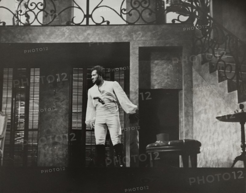 Rex Ingram with gun in pants, 1938.