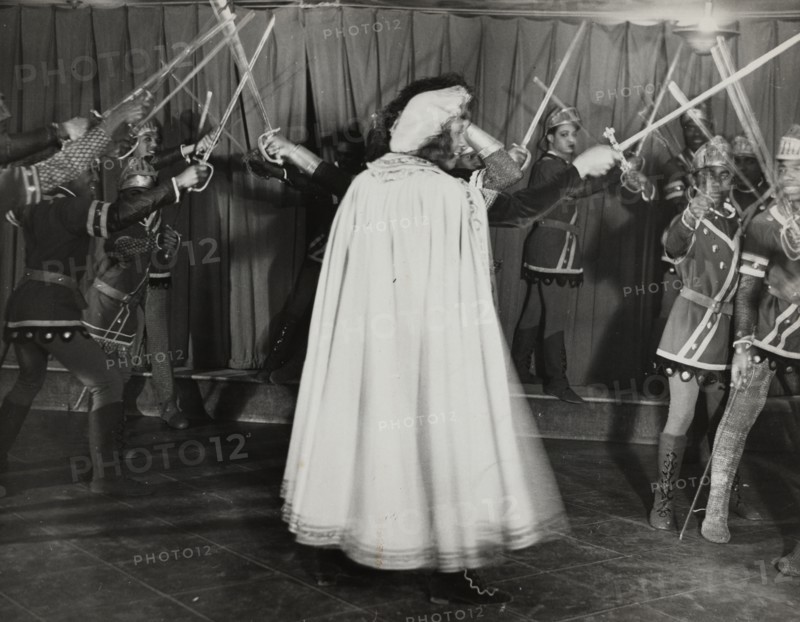 Soldiers with swords raised, 1936.