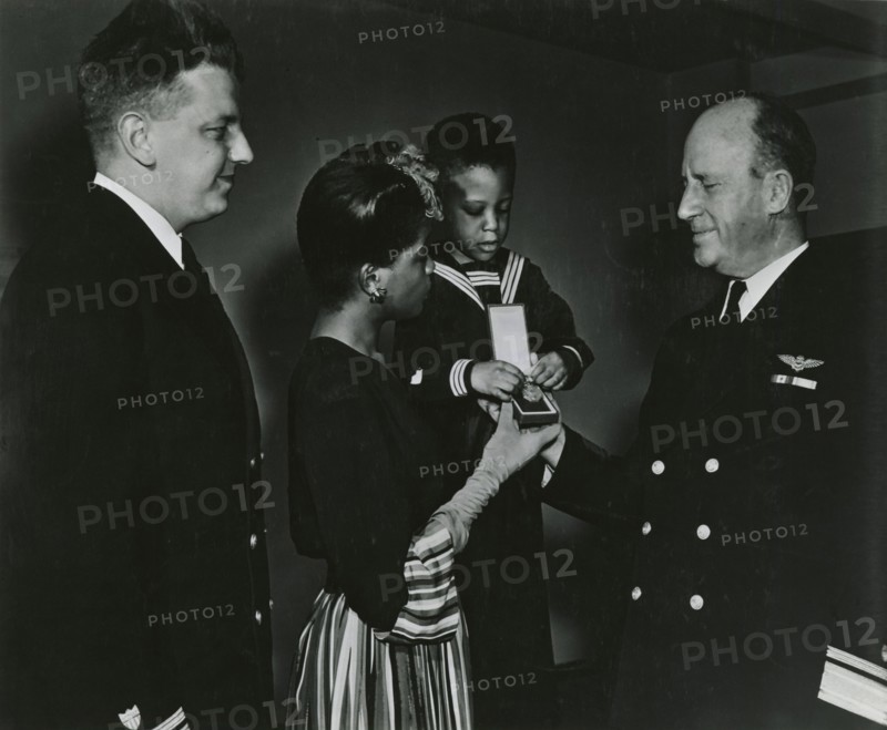 Mrs. Charles W. David, Jr.; African American widow and her three-year-old son, Neil..., 1939 - 1945. Creator: United States Coast Guard.