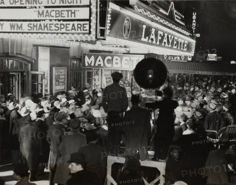 Crowds outside the Lafayette Theatre in Harlem at the opening of "Macbeth", 1936.