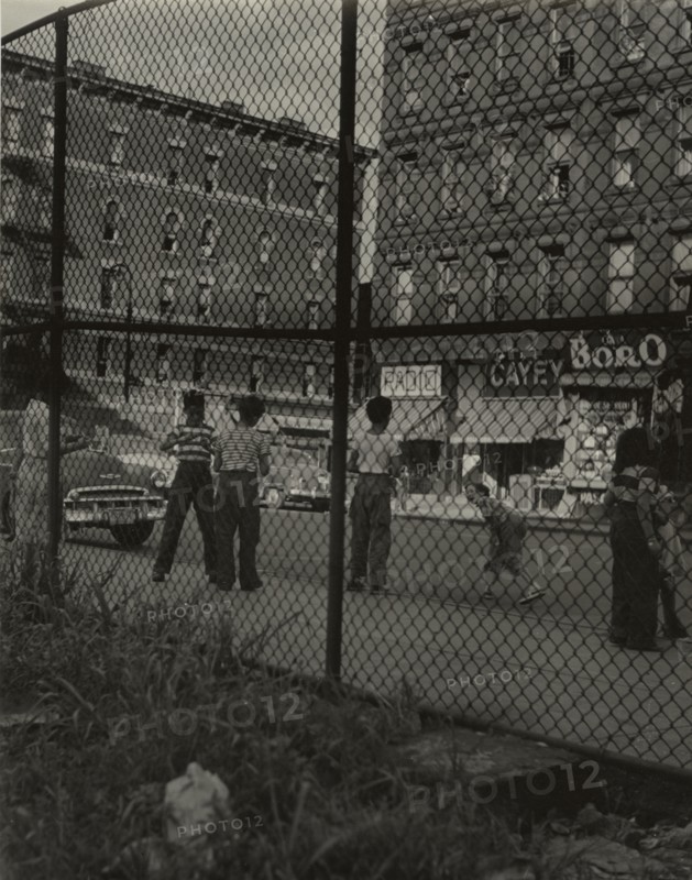 Madison Avenue - Children playing along Madison Avenue, East Harlem, New York City, 1947 - 1951.