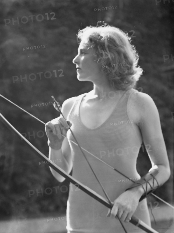 Chase, Diana, Miss, doing archery, 1933 June 22. Creator: Arnold Genthe.