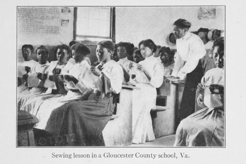 Sewing lesson in a Gloucester County school, Va., 1915. Creator: Unknown.