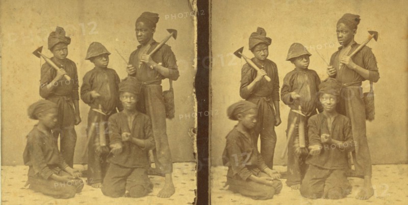 Studio portait of young chimney sweeps, (1868-1900?). Creator: J. N. Wilson.