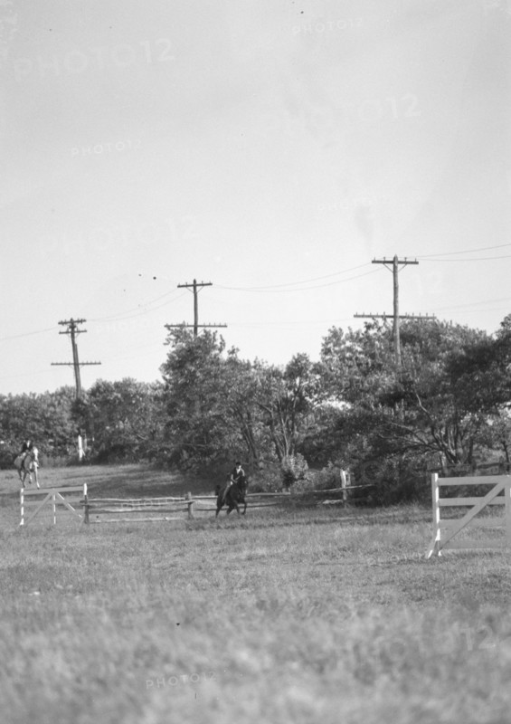 Horse show or show jumping event, between 1911 and 1942. Creator: Arnold Genthe.