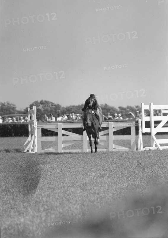 Horse show or show jumping event, between 1911 and 1942. Creator: Arnold Genthe.
