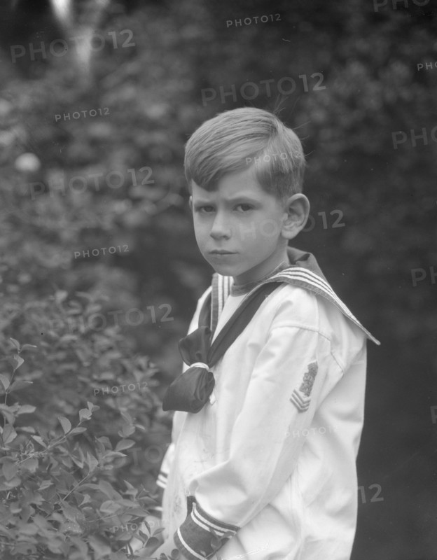 McCormick, Medill, child of, standing outdoors, 1923 May 21. Creator: Arnold Genthe.
