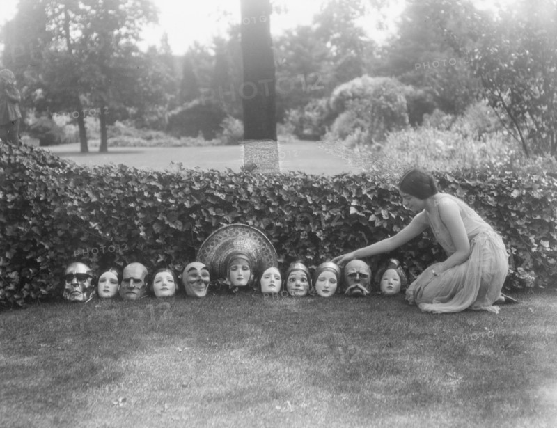 Display of masks made by W.T. Benda, not before 1925 Sept. 20. Creator: Arnold Genthe.
