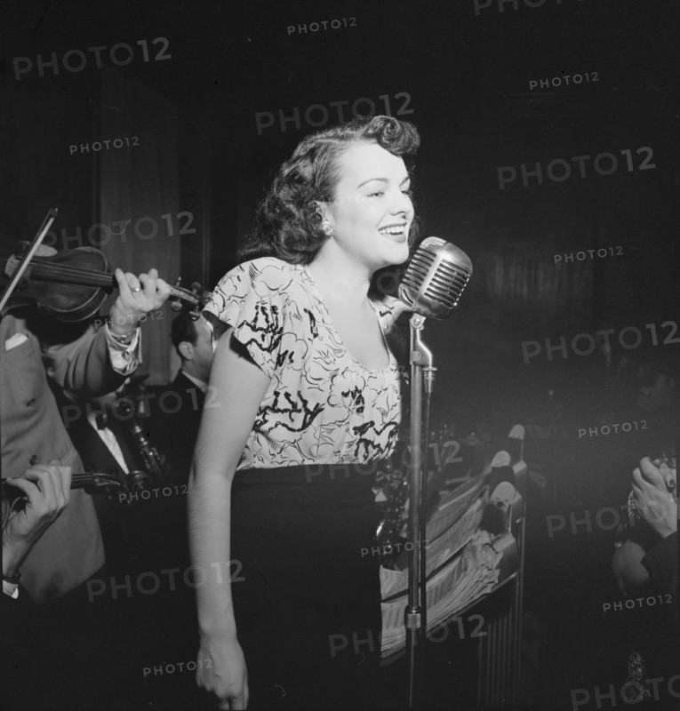 Portrait of a vocalist with Justin Stone's ensemble, 1938. Creator: William Paul Gottlieb.