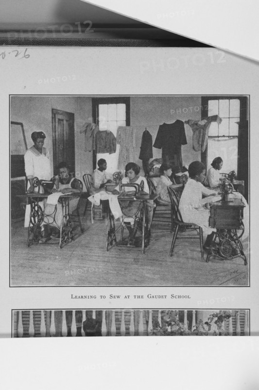 Learning to sew at the Gaudet School; [New Orleans, Louisiana], (1923?). Creator: Unknown.