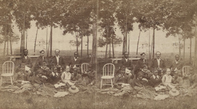 View of a group of tourists, some African American, c1850-c1930. Creator: Alexander Carson McIntyre.