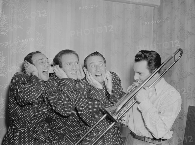 Portrait of Buddy Morrow and Ritz Brothers, New York, N.Y., ca. May 1947. Creator: William Paul Gottlieb.