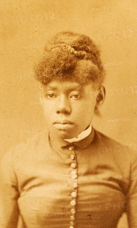 Portrait of unidentified young woman with buttoned bodice and band collar, (1880-1889?). Creator: H. A. Insley.