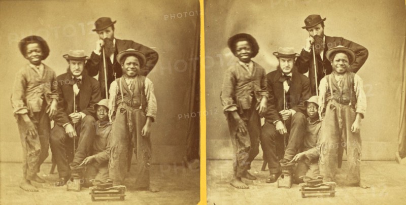Shoe Blacks. [Studio portrait of three young shoe shiners and their customers], (1868-1900?). Creator: Unknown.