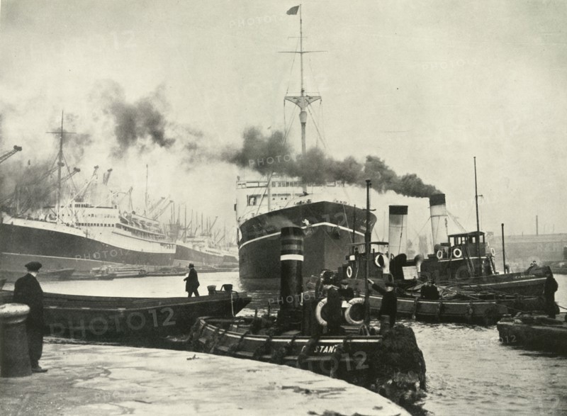 Into the Arena Where Ships Made Their Unending Entrances and Exits A Vessel Docking at...', 1937. Creator: Fox.