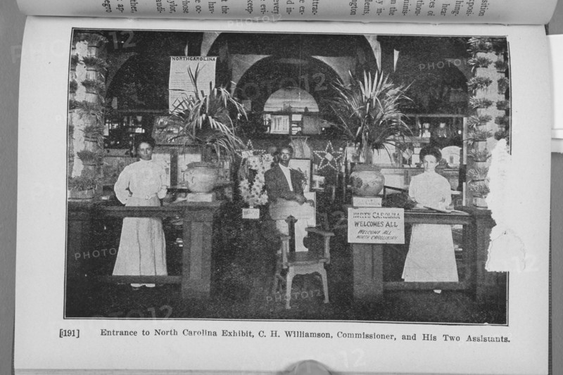 Entrance to North Carolina Exhibit, C. H. Williamson, Commissioner, and his two assistants, 1911. Creator: Unknown.