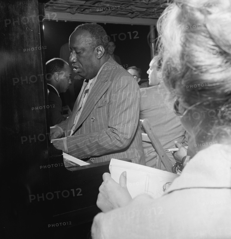 Portrait of James P. (James Price) Johnson, Riverboat on the Hudson, N.Y., ca. July 1947. Creator: William Paul Gottlieb.