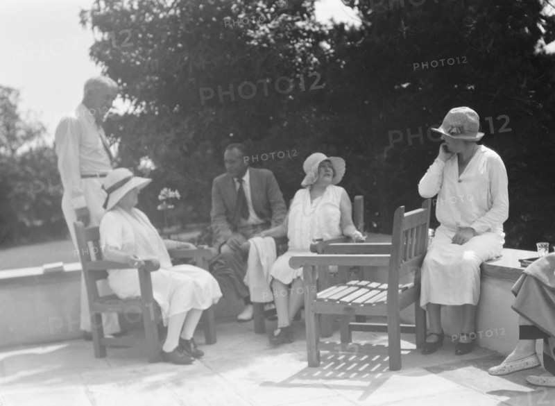 Group of people at "The Shallows," property of Lucien Hamilton Tyng, Southampton, Long Island, 1931  Creator: Arnold Genthe.