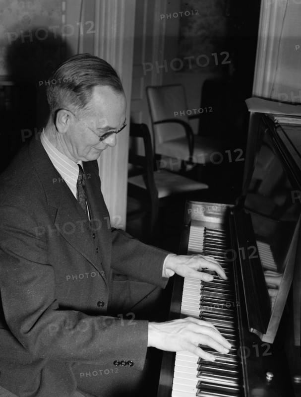 Portrait of Roy J. Carew in his home, 818 Quintana Place NW, Washington, D.C., ca. Feb. 1942. Creator: William Paul Gottlieb.