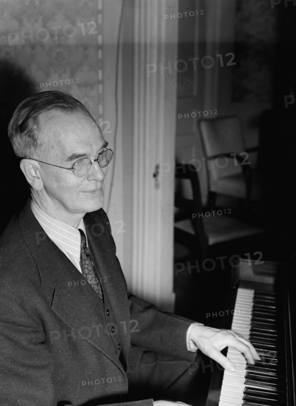 Portrait of Roy J. Carew in his home, 818 Quintana Place NW, Washington, D.C., ca. Feb. 1942. Creator: William Paul Gottlieb.