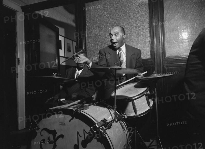 Portrait of Freddie Moore, William P. Gottlieb's office party, Jamaica, Queens, N.Y., ca. 1948. Creator: William Paul Gottlieb.