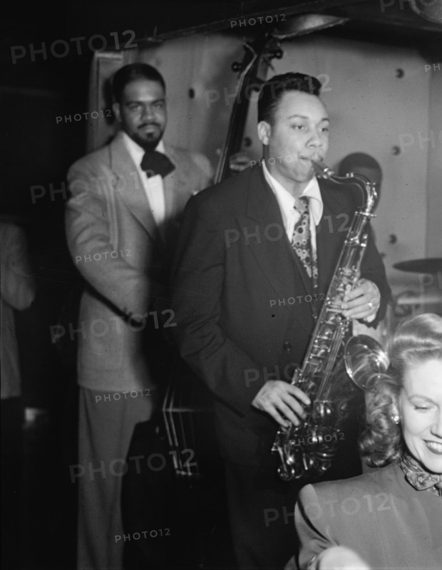 Portrait of Lucky Thompson, Hilda A. Taylor, and Al McKibbon, Three Deuces, N.Y., ca. July 1948. Creator: William Paul Gottlieb.