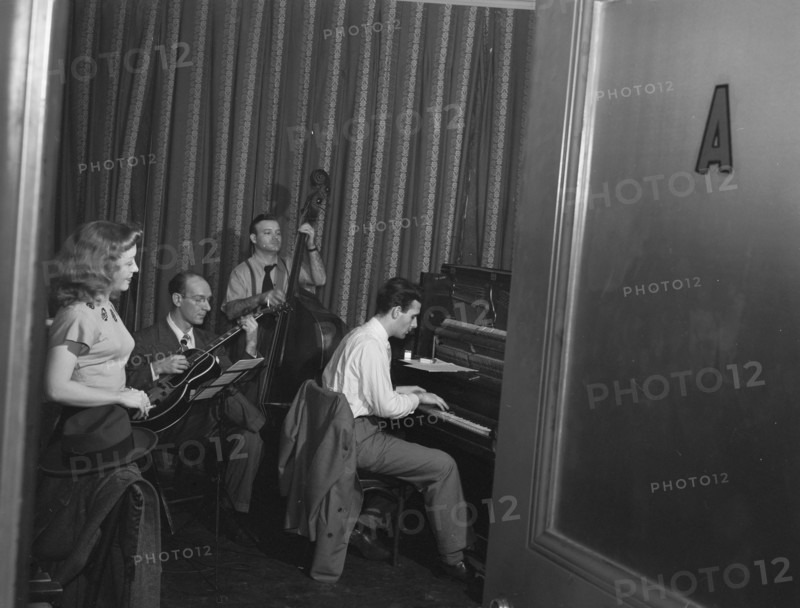 Portrait of Helen Carr, Sammy Herman, Joe Bianco, and Donn Trenner, Nola's, N.Y., ca. Feb. 1947. Creator: William Paul Gottlieb.