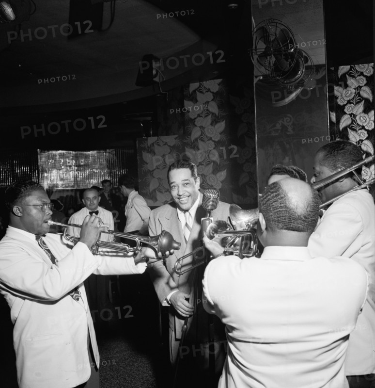 Portrait of Duke Ellington, Cat Anderson, and Sidney De Paris(?), Aquarium, New York, N.Y., 1946. Creator: William Paul Gottlieb.