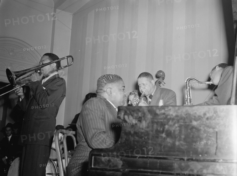 Portrait of Jay Higginbotham, Pete Johnson, Henry Allen, and Lester Young... Washington, D.C., c1940 Creator: William Paul Gottlieb.
