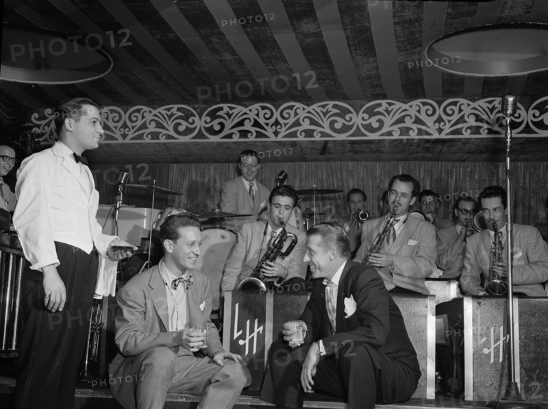 Portrait of Sam Donahue, Stan Kenton, Nick Callonus, and Hep, Aquarium, New York, N.Y., c.Dec. 1946. Creator: William Paul Gottlieb.