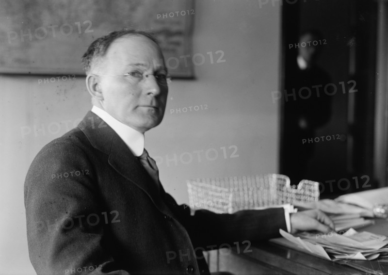 Walker D. Hines, Director General, U.S.R.R. Adm., at Desk, 1917. Creator: Harris & Ewing.
