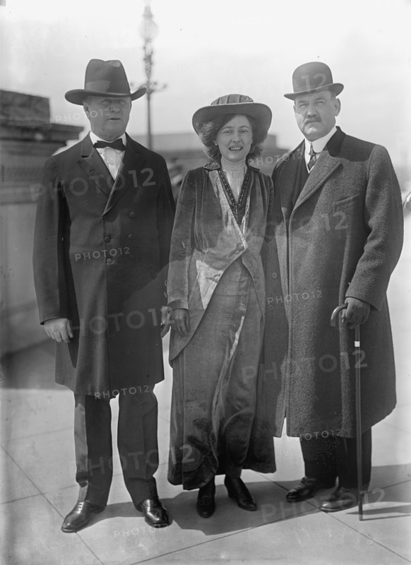 Bird Segle McGuire with Rep. J.S. Davenport, left, and Mrs. McGuire, 1913. Creator: Harris & Ewing.