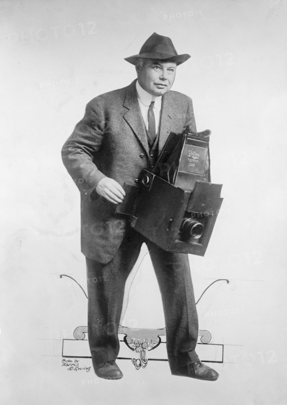 Photographer with Large Format Camera, 1914. Creator: Harris & Ewing.